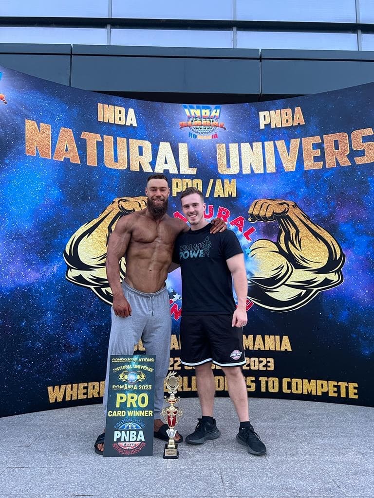 Champion bodybuilder posing on stage